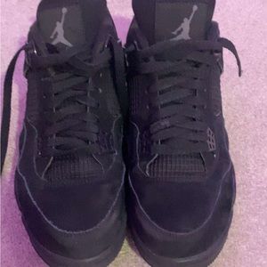 Black cat jordan 4s